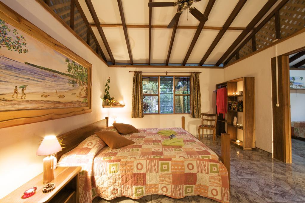 Hotel Suizo Loco Lodge & Resort Кауита Номер фото